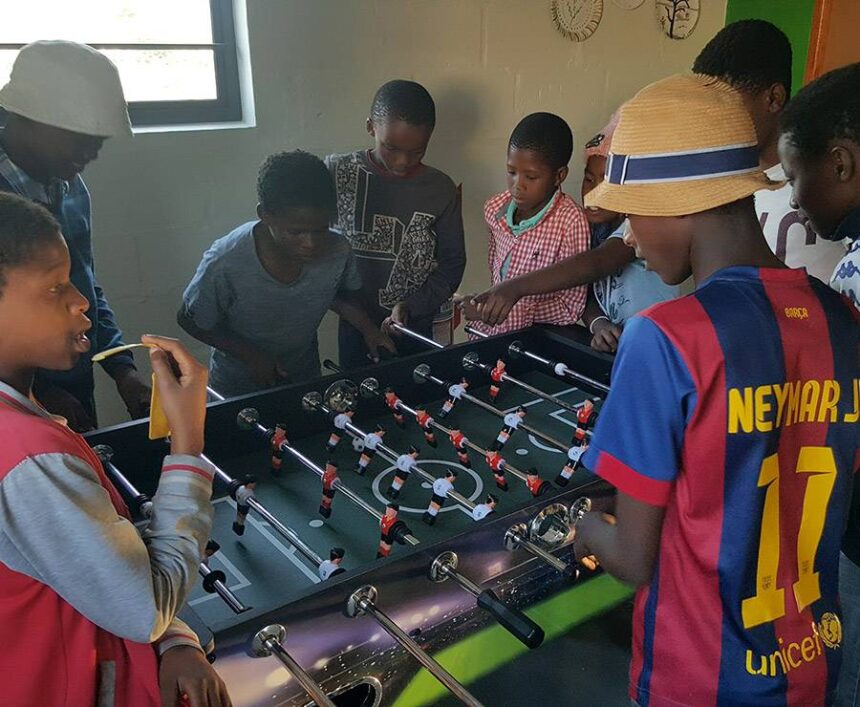 Champions playing the soccer table